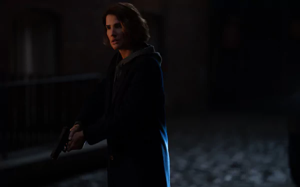 HD desktop wallpaper featuring a mysterious figure from Secret Invasion standing in a dimly lit alley, evoking an atmosphere of intrigue and suspense.