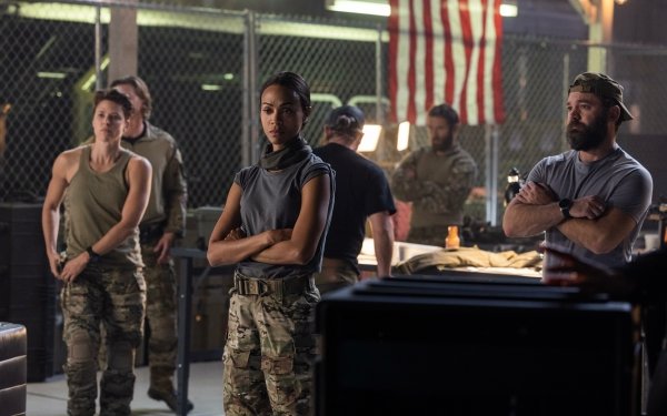 HD wallpaper featuring Zoe Saldana in Special Ops: Lioness, with actors in a military setting.