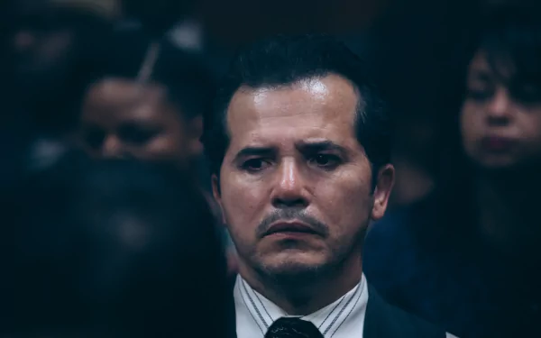 Intense portrait of a man in a suit with a focused expression, suitable as an HD desktop wallpaper or background.