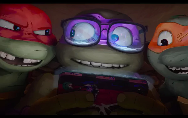 Three Teenage Mutant Ninja Turtles share a joyful moment, engrossed in a game on a phone. This vibrant image from Teenage Mutant Ninja Turtles: Mutant Mayhem serves as an engaging HD desktop wallpaper.