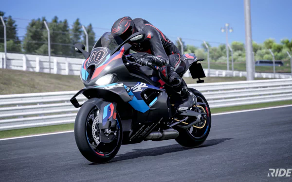 HD desktop wallpaper featuring a motorcyclist racing on a track from the video game Ride 5.