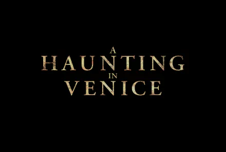 HD desktop wallpaper featuring the movie title A Haunting in Venice in elegant gold text on a black background.