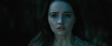 Intense HD desktop wallpaper featuring a woman with a worried expression, amidst dark surroundings, evoking the mood of the tag 'No One Will Save You.'