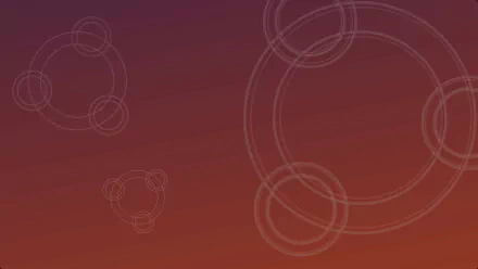 HD Ubuntu minimalist desktop wallpaper with orange to purple gradient and subtle concentric circles.