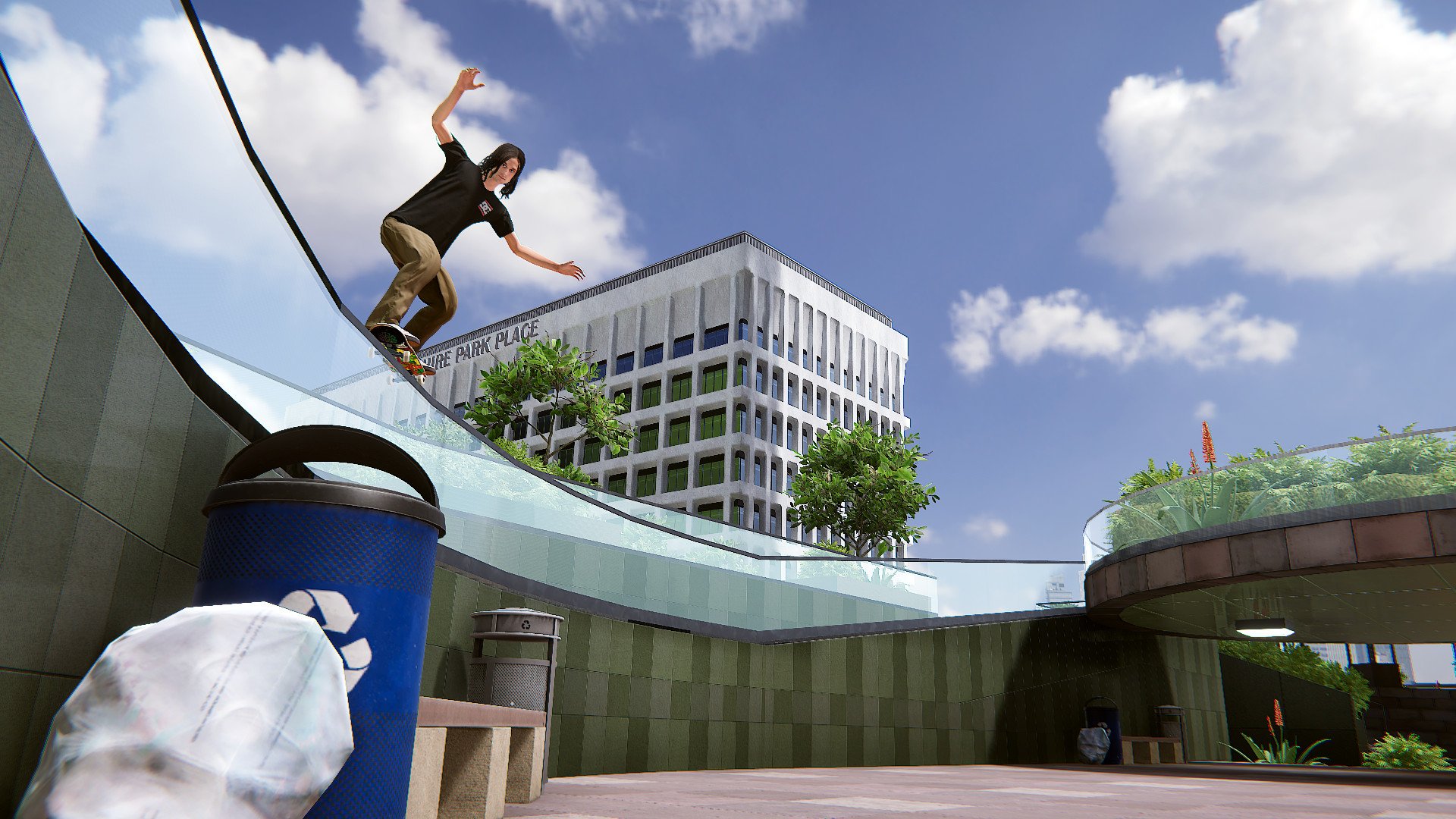 HD wallpaper of a Skater XL game character performing a trick on a skateboard in an urban environment with buildings in the background.