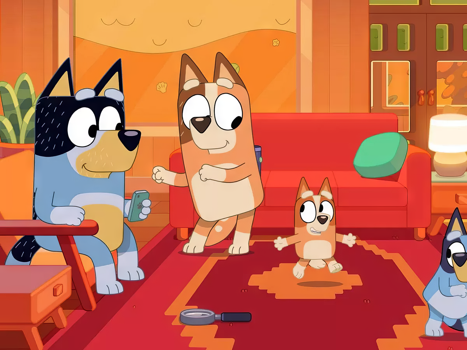 HD wallpaper featuring the animated characters from Bluey in a cozy living room setting for desktop background.