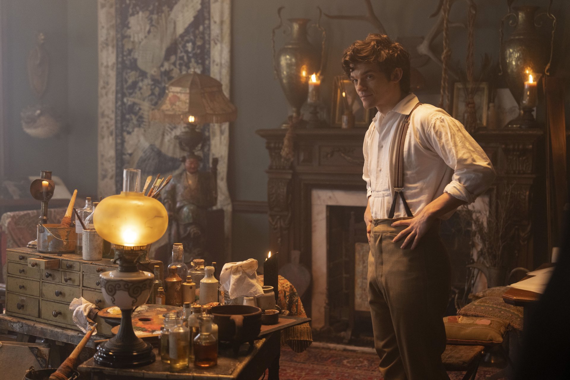 HD desktop wallpaper featuring a scene from Belgravia: The Next Chapter with a character in a vintage room with antique decor, exuding a historical drama ambiance.