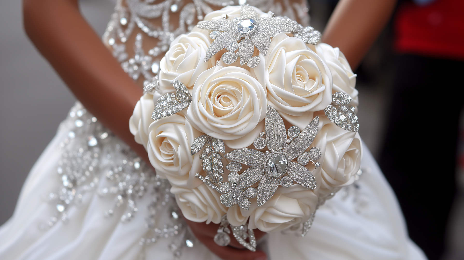 A stunning wedding bouquet featuring elegant white roses adorned with shimmering silver accents, captured in high-definition for a beautiful desktop wallpaper or background.