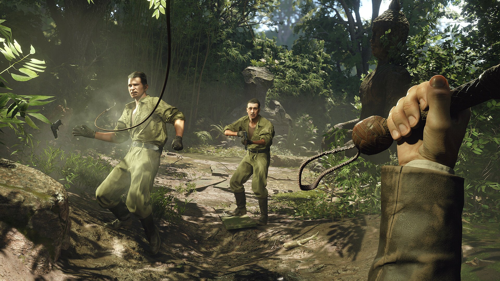 HD wallpaper of an intense moment from the video game Indiana Jones and the Great Circle, showing adventurous characters navigating through a dense jungle environment.