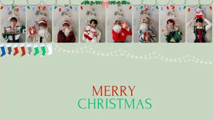 HD PC desktop wallpaper featuring Stray Kids members dressed in festive Christmas attire with holiday decorations and Merry Christmas text, blending music and seasonal cheer.