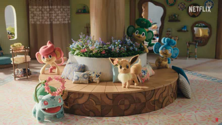 HD desktop wallpaper featuring characters from the Pokemon Concierge TV show on Netflix with a whimsical room setting and Pokemon like Eevee and Bulbasaur.