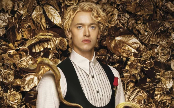 HD wallpaper featuring a character from The Hunger Games: The Ballad of Songbirds & Snakes, set against a backdrop of golden foliage with a subtle snake motif.