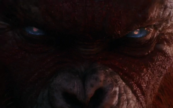 Close-up of a fierce, detailed creature's face from the movie Godzilla x Kong: The New Empire, serving as a stunning HD desktop wallpaper.
