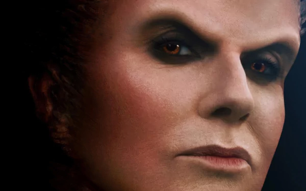 Close-up of a character from the TV show Percy Jackson and the Olympians, showcasing dramatic makeup and intense expression, designed as a high-definition desktop wallpaper.