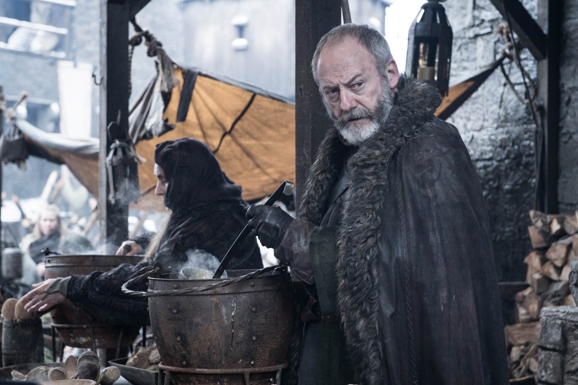 HD wallpaper featuring Davos Seaworth from Game of Thrones, portrayed by Liam Cunningham, in a medieval setting.