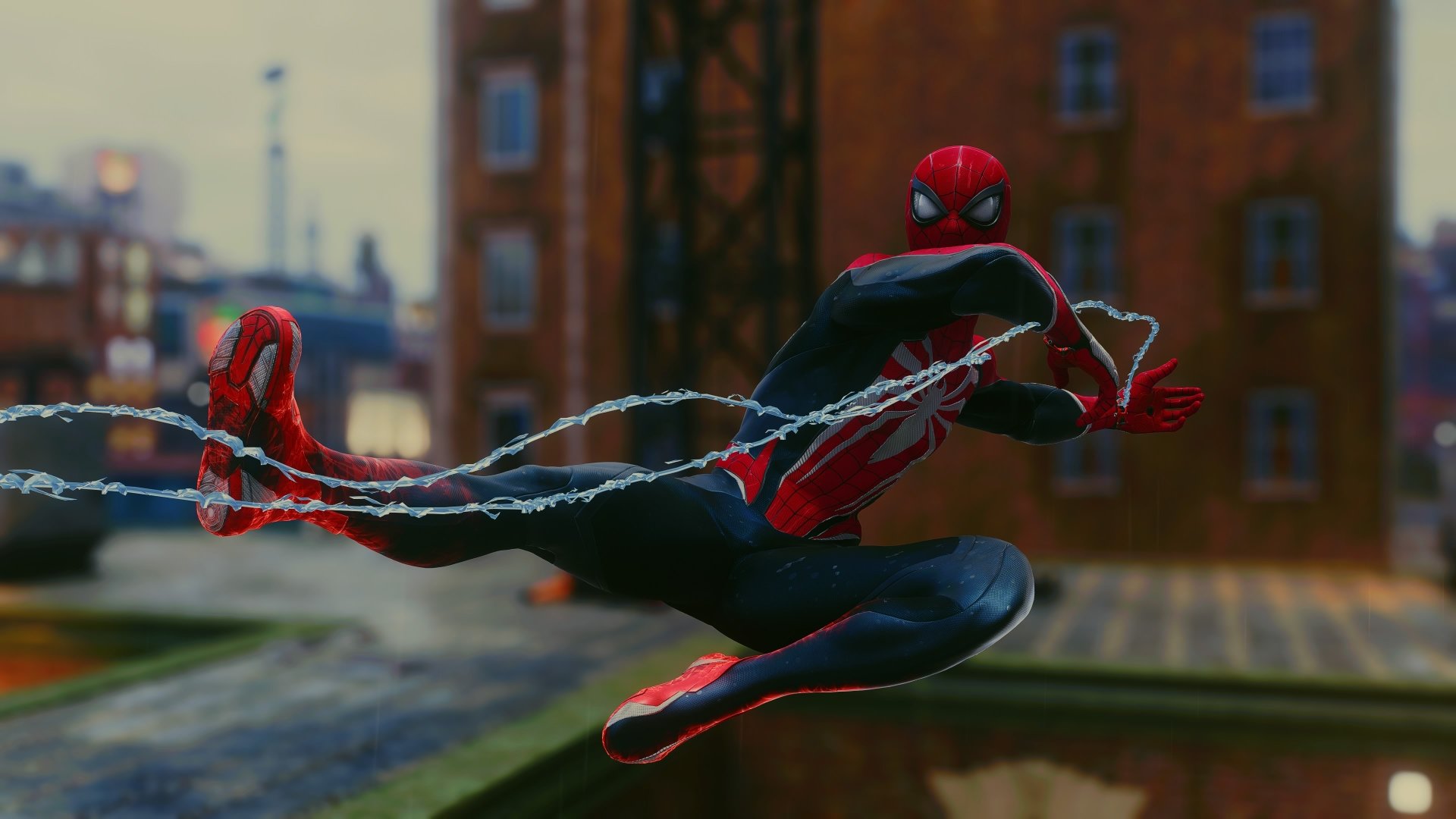 4K Ultra HD desktop wallpaper featuring Spider-Man swinging through an urban setting from the video game Marvel's Spider-Man 2.