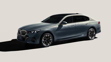 HD wallpaper of a BMW i5 M Sport vehicle for desktop background.