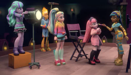 HD desktop wallpaper of Monster High characters on set, with colorful lighting and detailed animation.