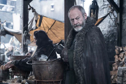HD wallpaper featuring Davos Seaworth from Game of Thrones, portrayed by Liam Cunningham, in a medieval setting.