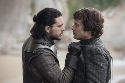 HD wallpaper featuring intense moment from Game of Thrones with two central characters facing each other.
