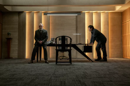 HD wallpaper featuring a tense scene from the TV Show The Three-Body Problem with two characters in a dimly lit room facing each other across a desk.