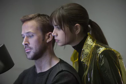 HD desktop wallpaper featuring a scene from the movie Blade Runner 2049 with a character resembling Officer K looking contemplative alongside a female character.