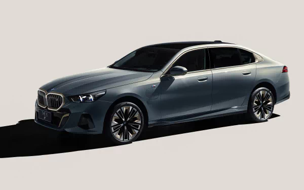 HD wallpaper of a BMW i5 M Sport vehicle for desktop background.