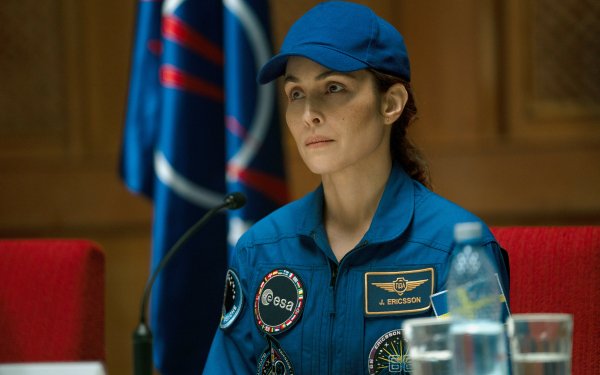 Actress in a blue ESA spacesuit portraying a character in the TV show 'Constellation' (2024), available as an HD desktop wallpaper and background.
