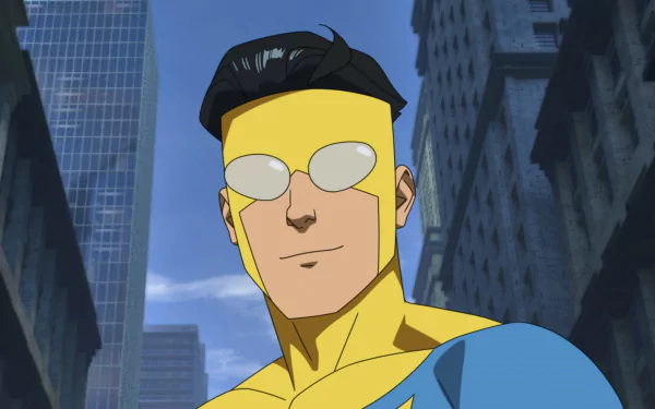 HD wallpaper of Invincible cartoon character from the TV show standing in a cityscape, showcasing the iconic blue and yellow superhero costume.