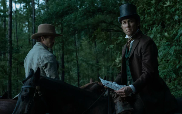 HD desktop wallpaper featuring two characters on horseback in a forest scene from the TV show Manhunt (2024).