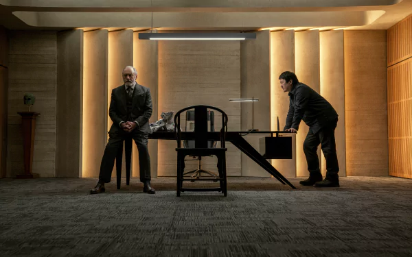 HD wallpaper featuring a tense scene from the TV Show The Three-Body Problem with two characters in a dimly lit room facing each other across a desk.