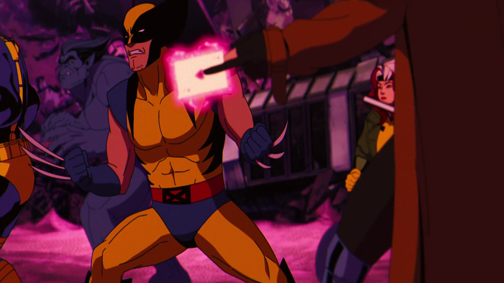 A dynamic lineup of Wolverine, Beast, Rogue, and Gambit from Marvel Comics against a vivid background in this HD wallpaper.