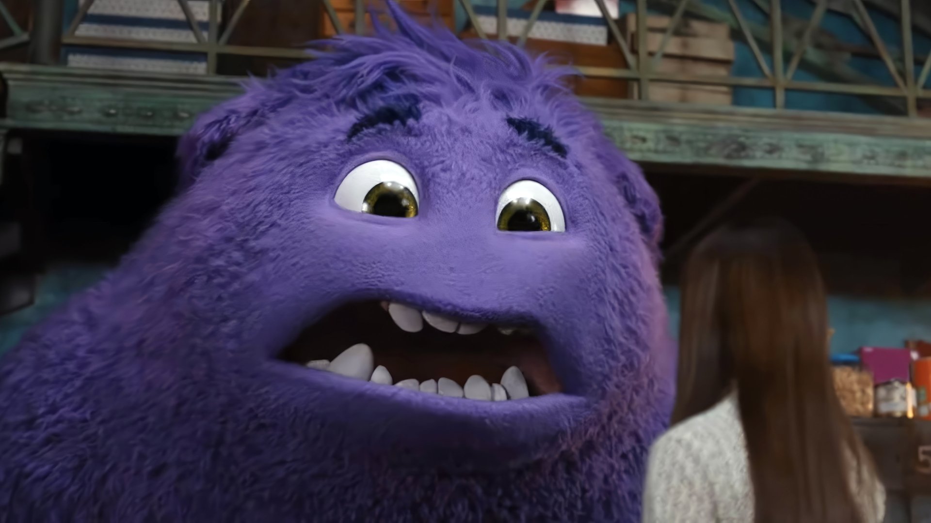 HD desktop wallpaper from the movie IF (2024) featuring a smiling purple creature with a backdrop of an indoor setting.