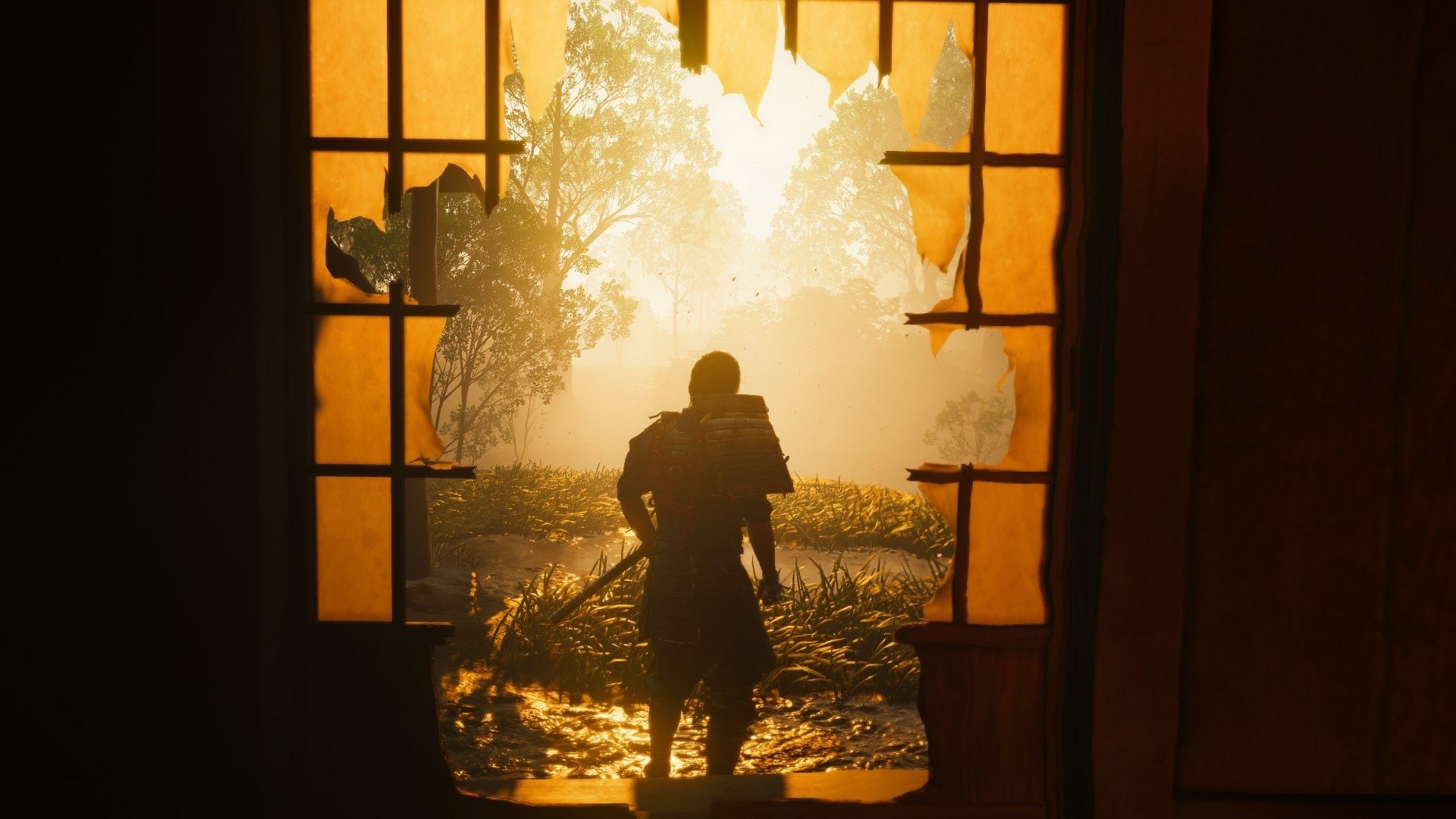 HD desktop wallpaper featuring a scene from the video game Ghost of Tsushima, depicting a warrior silhouetted against the sunrise, viewed through a shattered window.