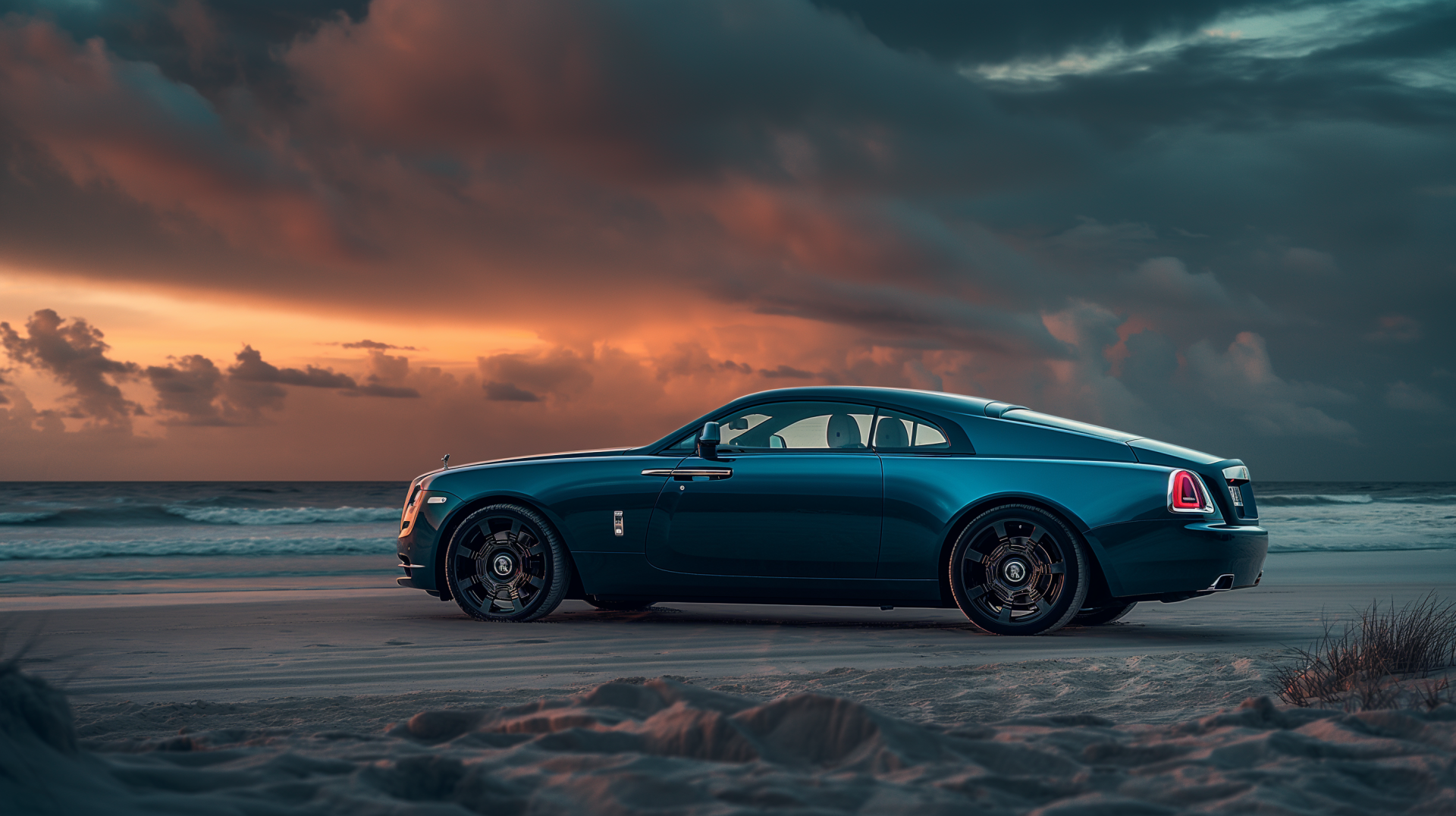 Rolls-Royce Spectre coupe parked on a windswept beach at sunset — luxury vehicle car shown as a 2K Quad HD PC desktop wallpaper and background.