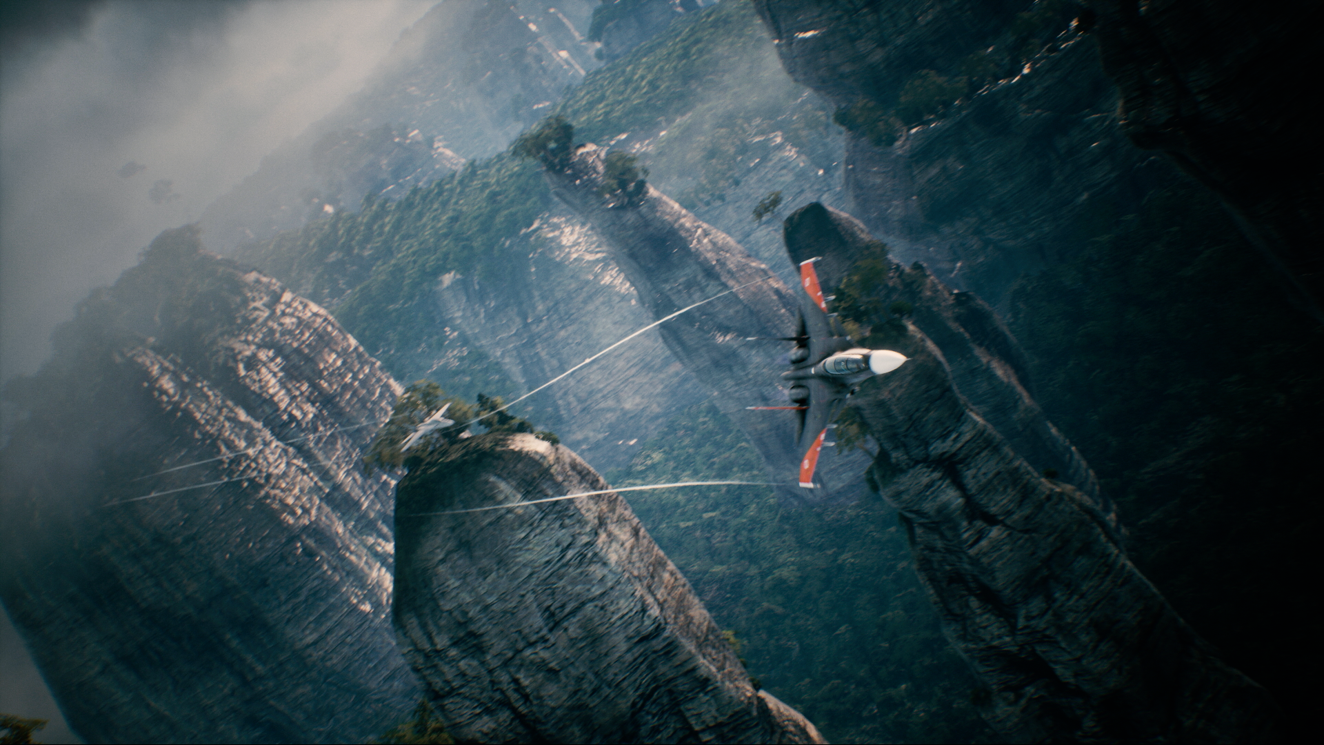 HD desktop wallpaper of Ace Combat 7: Skies Unknown, featuring a stunning aerial view with a fighter jet flying between rugged, towering rock formations and lush greenery under a cloudy sky.