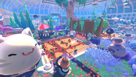 HD desktop wallpaper from Slime Rancher 2 featuring a vibrant conservatory with cute slimes, lush vegetation, and whimsical farming equipment.