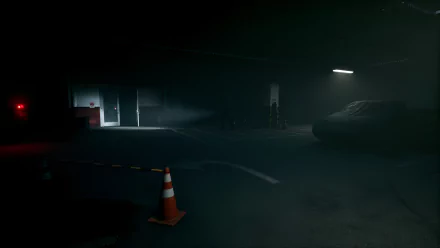 HD desktop wallpaper of The Bridge Curse 2: The Extrication video game, featuring a dimly lit, eerie parking garage with shadows and scattered traffic cones.