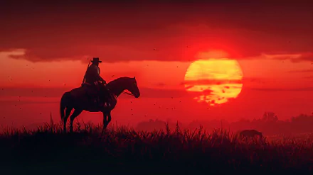 HD wallpaper of Red Dead Redemption 2 featuring a cowboy on horseback against a striking red sunset.