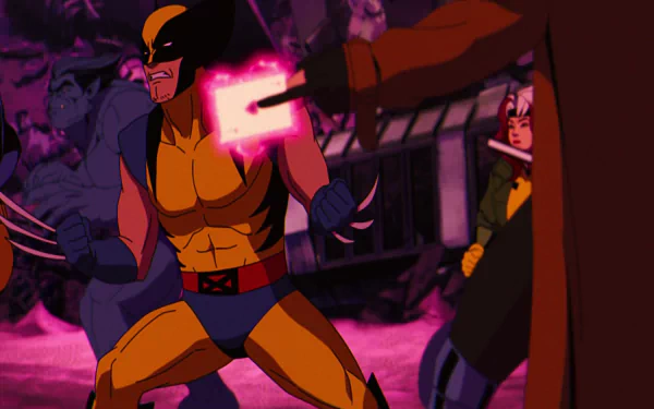 A dynamic lineup of Wolverine, Beast, Rogue, and Gambit from Marvel Comics against a vivid background in this HD wallpaper.