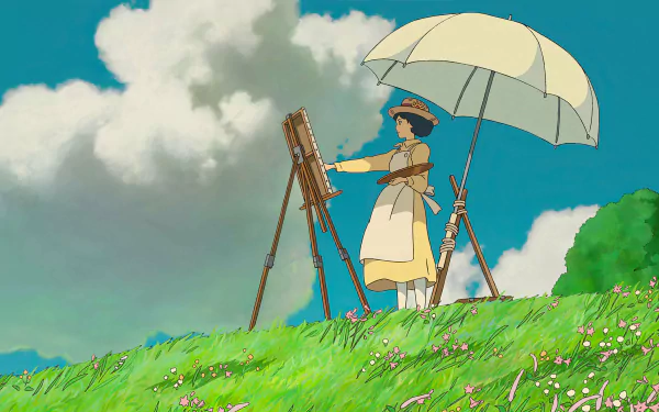 Anime scene from Studio Ghibli's The Wind Rises, depicting a character painting outdoors under an umbrella, set against a bright sky with lush green grass and scattered flowers. HD desktop wallpaper.