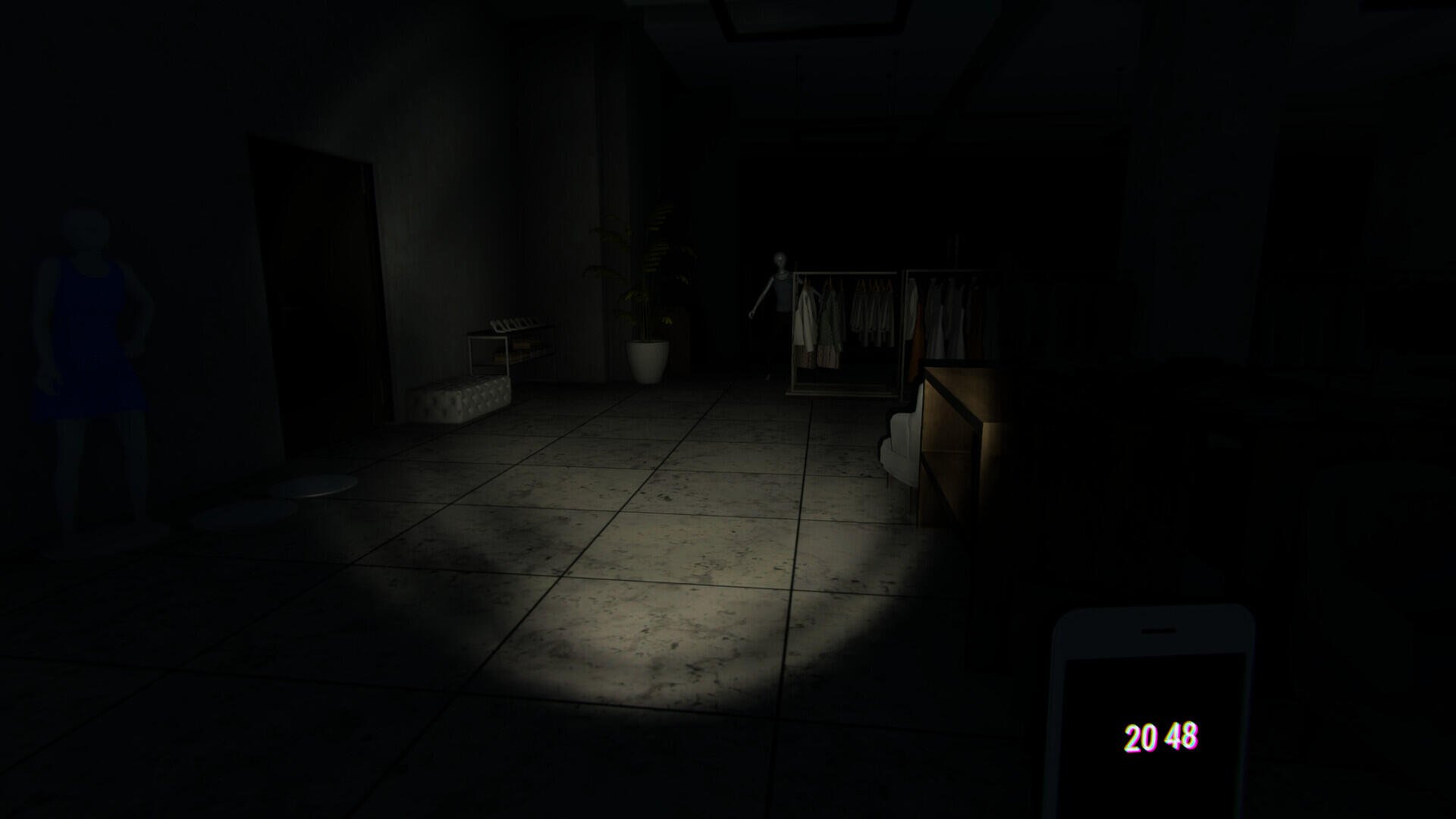 A dimly lit room from the video game Mannequin (2024), featuring eerie shadows and a mannequin in the background, creating a suspenseful atmosphere. HD PC desktop wallpaper.