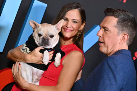 HD wallpaper featuring characters from the movie Family Switch, starring Jennifer Garner and Ed Helms, capturing the fun and chaos of family life.