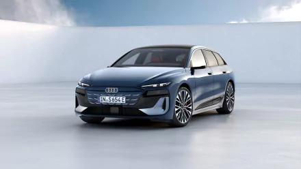 A sleek Audi S6 E-Tron parked against a modern backdrop, showcasing its dynamic design. This high-definition image serves as a stunning desktop wallpaper for car enthusiasts.