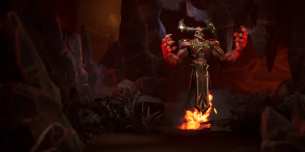 A dramatic scene from the video game Stormgate, featuring a powerful character with fiery red hands, set in a dark, cavernous environment. This HD wallpaper captures intense energy and atmosphere.