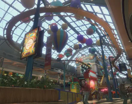 Vibrant HD wallpaper from Dead Rising Deluxe Remaster, showcasing a lively indoor amusement park with colorful decorations and attractions under a glass ceiling.