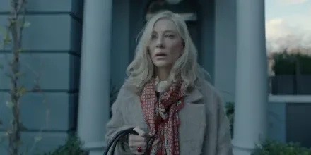 Cate Blanchett appears in a dramatic moment from the TV show Disclaimer (2024), captured in a high-definition desktop wallpaper featuring a somber backdrop.