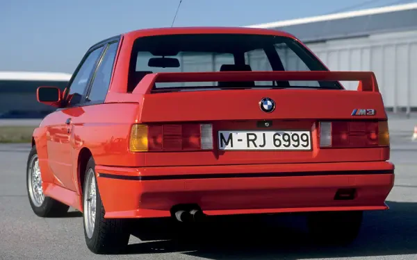 A sleek BMW E30 M3 stands out in this high-definition desktop wallpaper, capturing the essence of classic automotive design and performance.