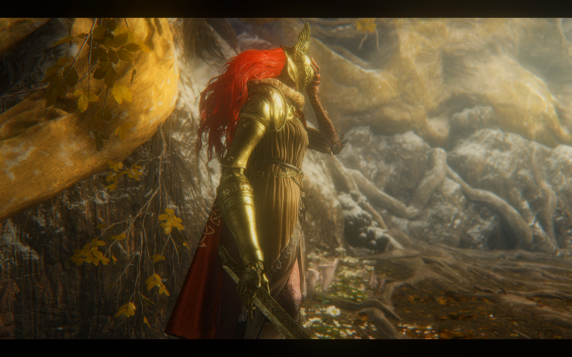 Malenia, Blade of Miquella, stands poised in a vibrant landscape, adorned in golden armor, capturing the essence of the Elden Ring universe in this HD desktop wallpaper.