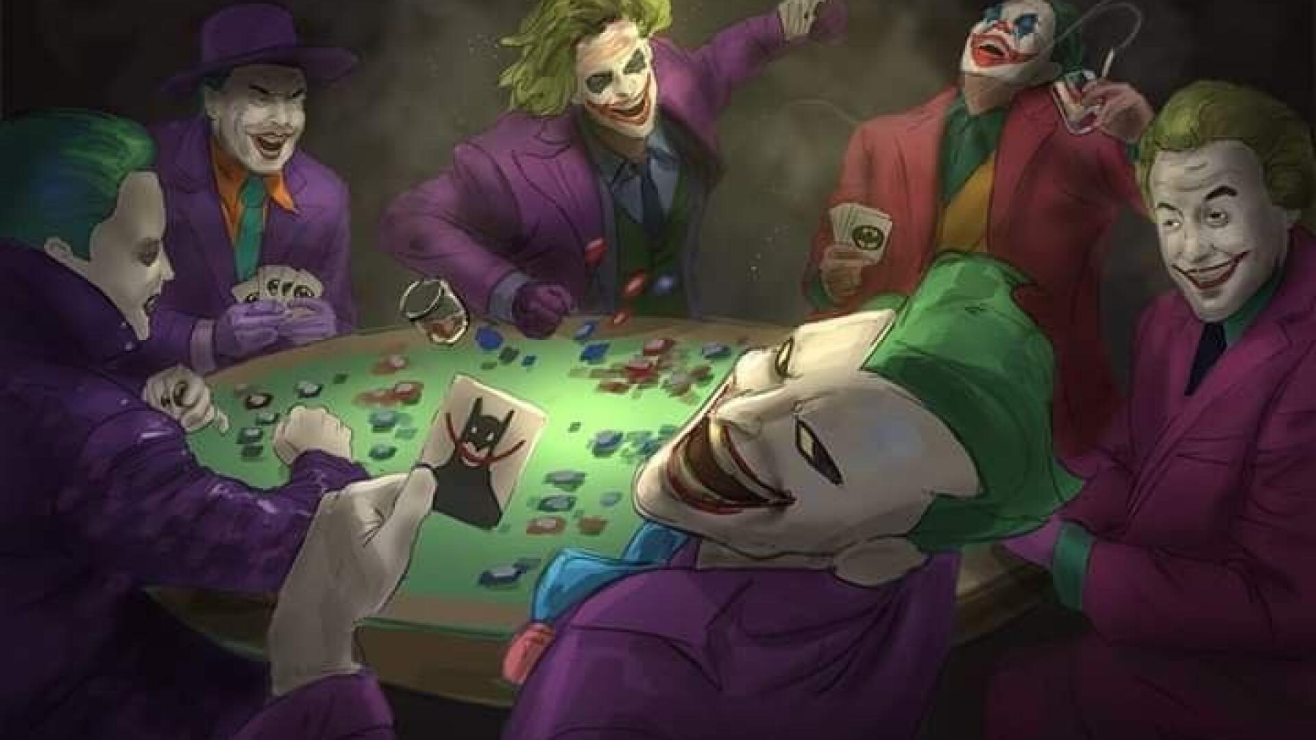 HD PC desktop wallpaper/background: Joker variants in purple suits and green hair laugh maniacally around a green-felt poker table strewn with cards and chips.